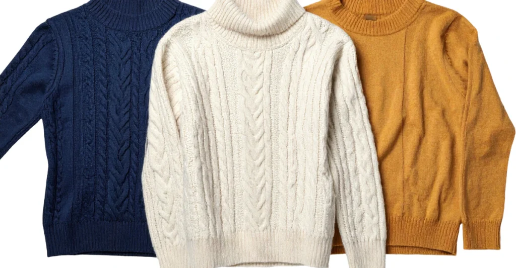 avy, cream, and mustard wool sweaters ready to be laid flat to dry