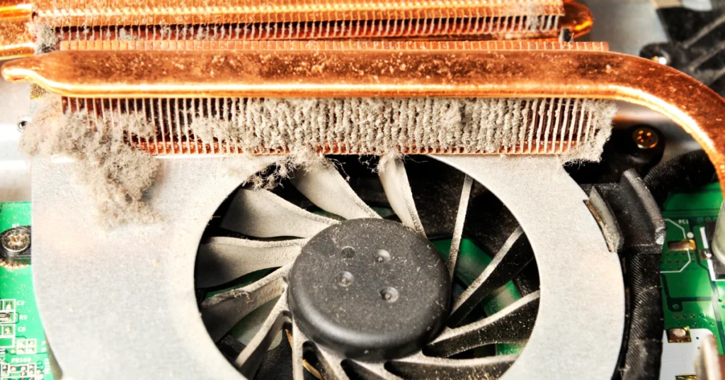 Laptop cooling fan and heat pipes inside a laptop