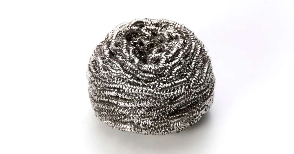 Steel wool pad used to seal gaps and keep rats out of the home