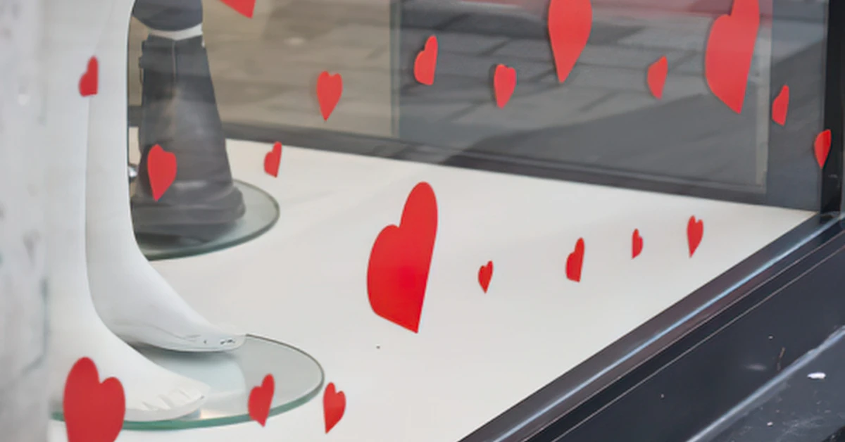 Red heart stickers on a glass window
