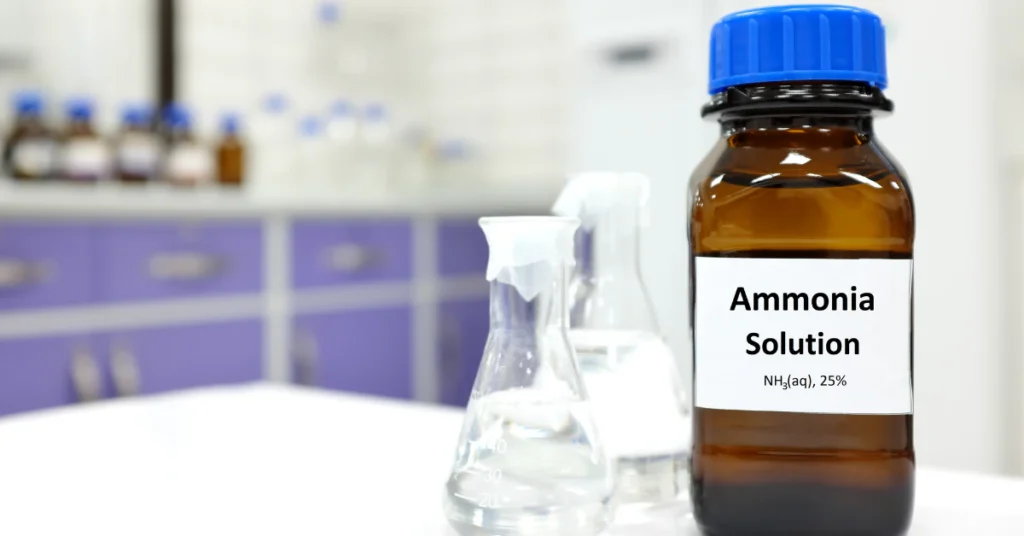 Brown laboratory bottle labeled ammonia solution, the compound that gives smelling salts their sharp smell